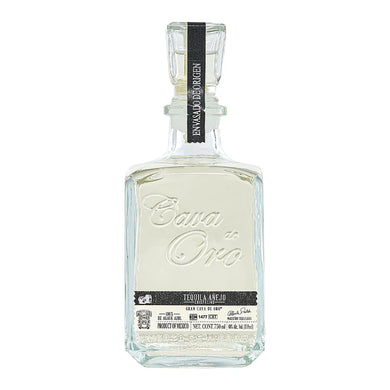 Discover the smooth and refined taste of Cava de Oro Tequila Añejo Cristalino. Aged 18 months, this premium tequila blends notes of vanilla, caramel, and oak, offering a perfect balance of flavor and elegance.