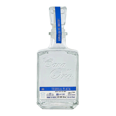 Experience the purity of Cava de Oro Tequila Plata. Made from 100% blue Weber agave, this premium tequila offers crisp flavors of sweet agave and citrus. Perfect for sipping or cocktails.  