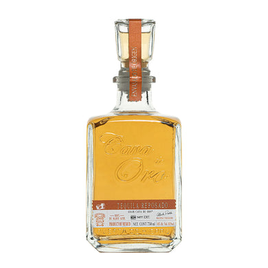 Discover the smooth, balanced flavors of Cava de Oro Tequila Reposado. Aged 6 months in French oak, it's perfect for sipping or your favorite cocktails.