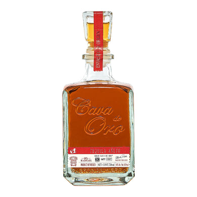 Indulge in the rich, complex flavors of Cava de Oro Tequila Añejo. Aged 12+ months in oak barrels, this premium tequila offers notes of caramel, vanilla, and toasted oak. Perfect for connoisseurs.  