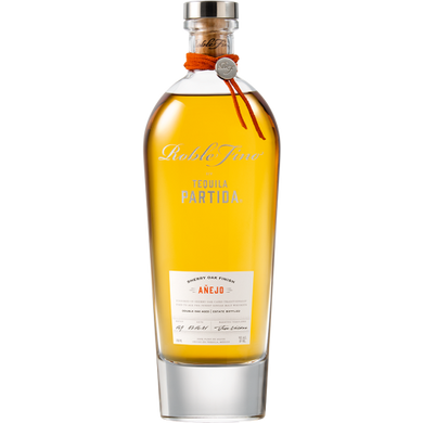 Discover the luxurious flavors of Tequila Partida Roble Fino Añejo. Aged in bourbon barrels and sherry casks, it offers rich notes of oak, agave, and dried fruit.