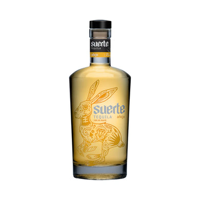 Experience the rich flavors of Suerte Tequila Añejo. Aged for 24 months, this premium tequila offers notes of caramel, vanilla, and oak for an exceptional tasting experience.