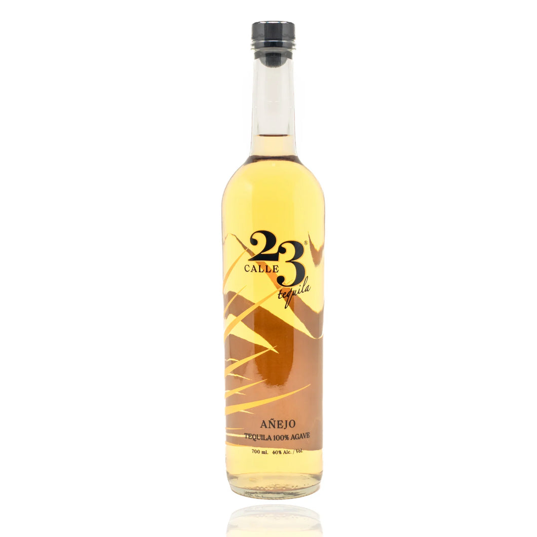 Experience Calle 23 Tequila Añejo, aged 16 months for a smooth, rich flavor with notes of dried fruits, vanilla, and toast. Perfect for sipping or cocktails.  