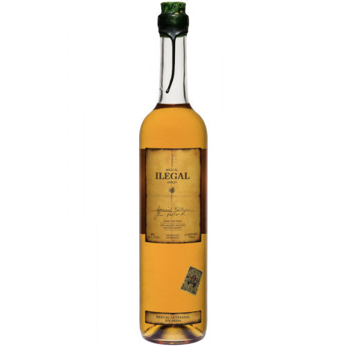 Discover Ilegal Mezcal Añejo, aged to perfection with notes of chocolate, oak, and subtle smoke. Handcrafted in Oaxaca, it's tradition in a glass.