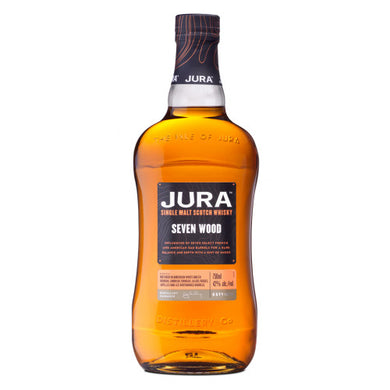 Discover Jura Seven Wood, a unique single malt Scotch whisky aged in seven different casks. Explore its layers of rich chocolate, spice, and tropical fruits.