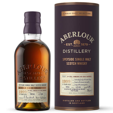 Image of a bottle of Aberlour 21 Year Old Scotch Whisky, featuring an elegant label with gold foil detailing, set against a rich wooden backdrop. The amber liquid in the bottle showcases the premium quality of this aged single malt whisky.